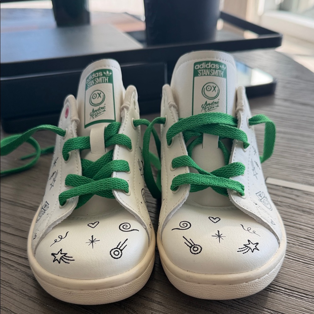 The coolest shoes!!!! Adidas Kids' Stan Smith White with Green Laces Sneakers